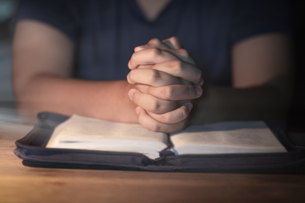 https://divineexchange.org.uk/wp-content/uploads/2020/09/teenager-woman-hand-with-cross-bible-praying-hands-folded-prayer_2379-1772.jpg